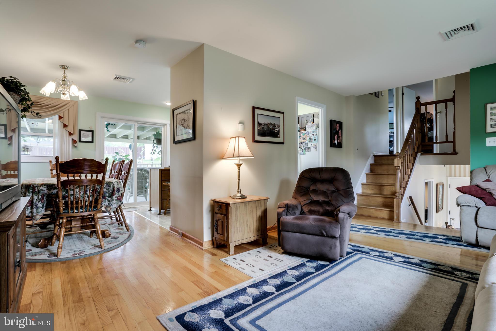449 West Maple Road Linthicum Heights, MD 21090 - Photo 6 of 30 a living room with furniture and wooden floor