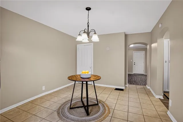 a kitchen with sink and cabinets