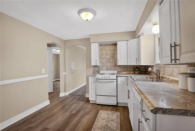 a view of walk in closet with white walls