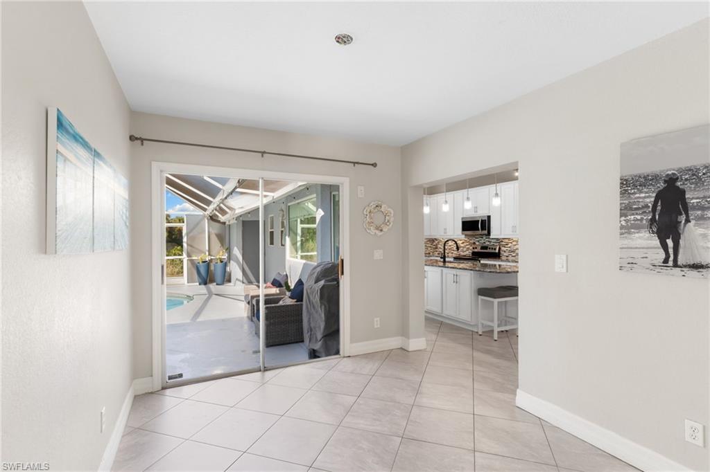 1061 15th Street Southwest Naples, FL 34117 - Photo 26 of 47 a view of a livingroom with furniture and windows