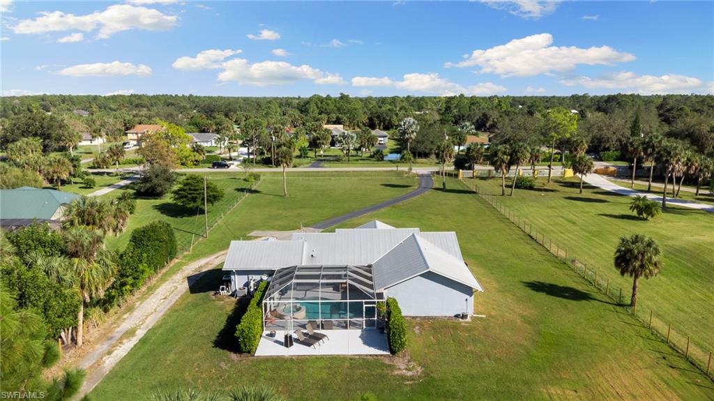 1061 15th Street Southwest Naples, FL 34117 - Photo 44 of 47 an aerial view of a house with a big yard