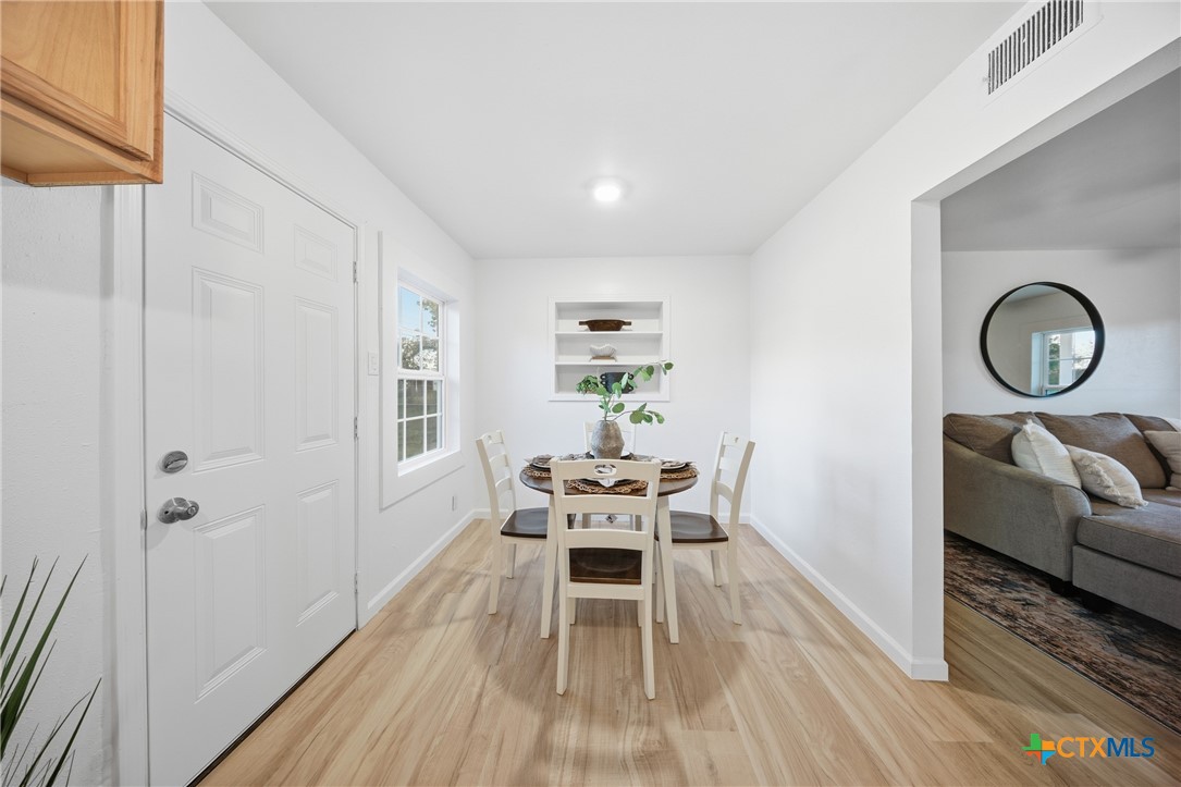 918 Fannin Loop Temple, TX 76501 - Photo 15 of 31 a dining room with furniture and wooden floor