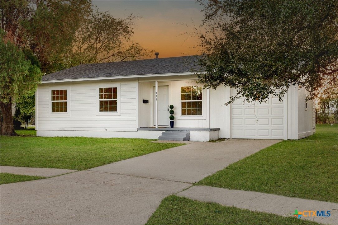 918 Fannin Loop Temple, TX 76501 - Photo 4 of 31 a front view of a house with a yard and garage