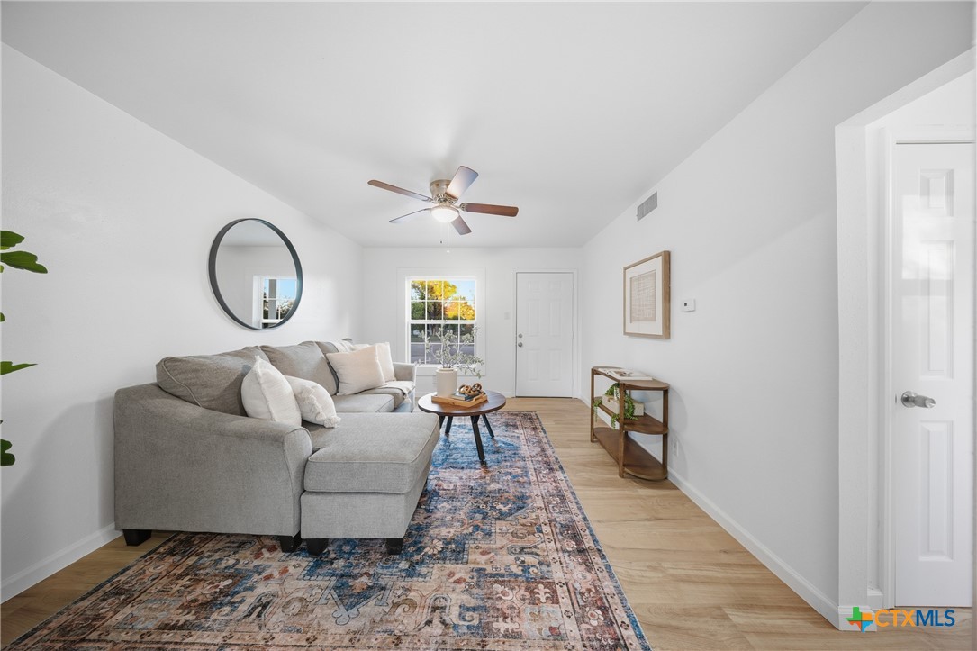 918 Fannin Loop Temple, TX 76501 - Photo 10 of 31 a living room with furniture and a rug