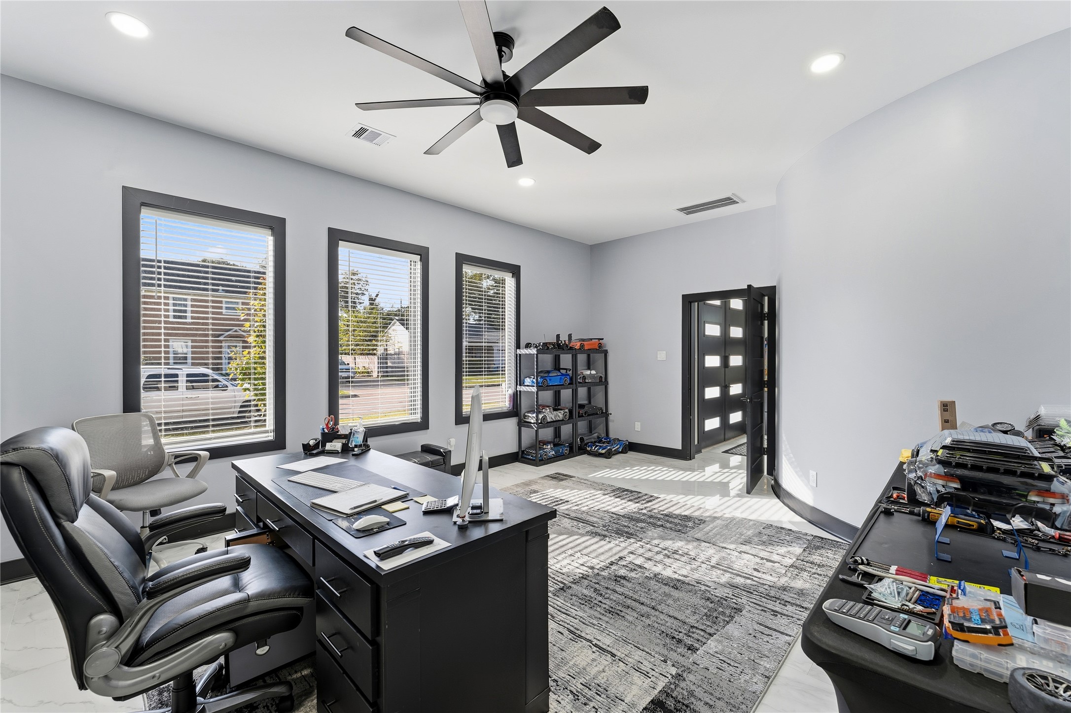 7737 Edna Street Houston, TX 77087 - Photo 17 of 43 a living room with furniture and a flat screen tv