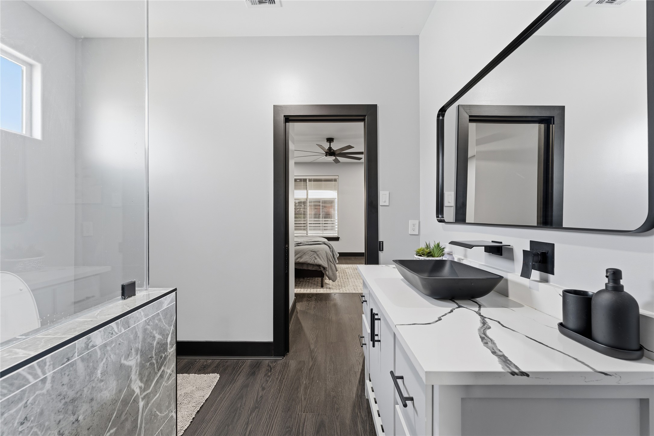 7737 Edna Street Houston, TX 77087 - Photo 20 of 43 a living room with furniture and a flat screen tv