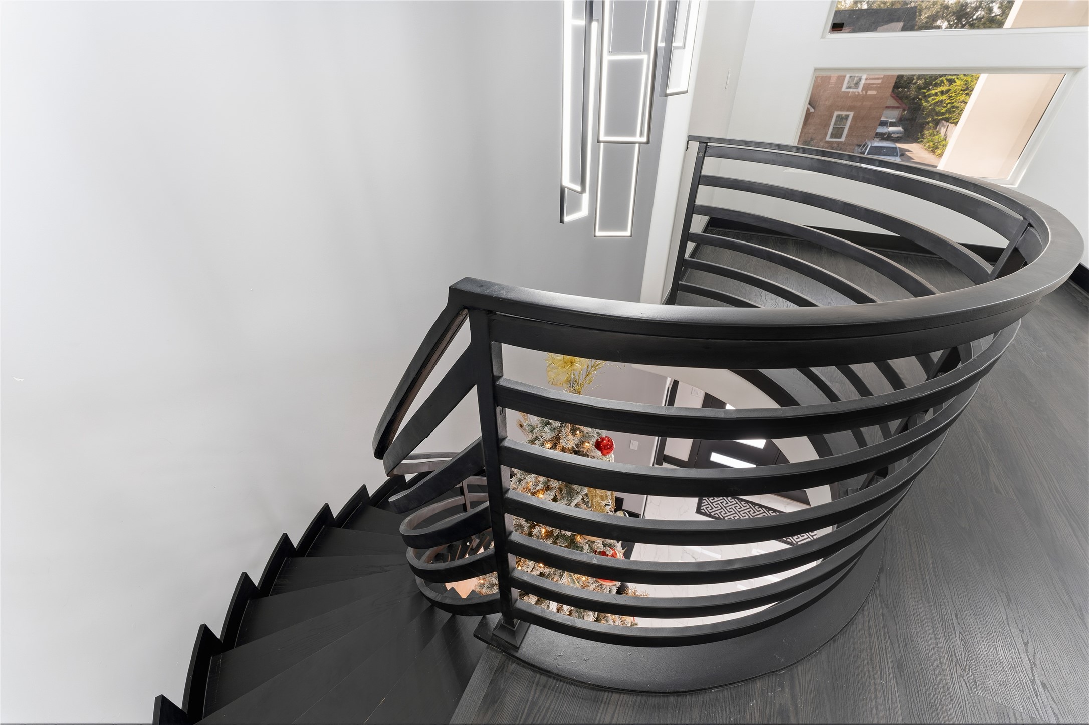 7737 Edna Street Houston, TX 77087 - Photo 26 of 43 a view of staircase with wooden floor