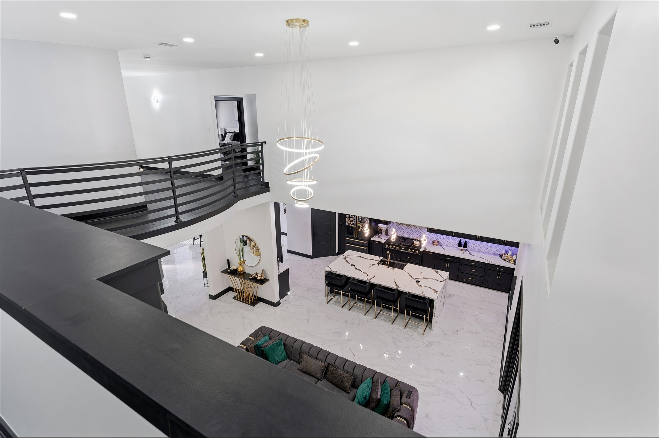 7737 Edna Street Houston, TX 77087 - Photo 28 of 43 a room with lots of white furniture and couches