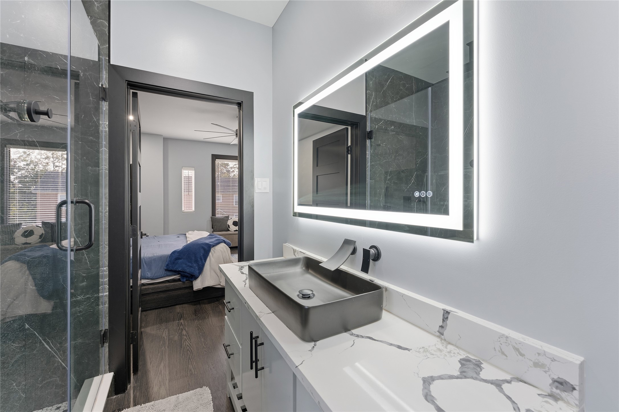 7737 Edna Street Houston, TX 77087 - Photo 34 of 43 a bathroom with a sink vanity granite and a mirror