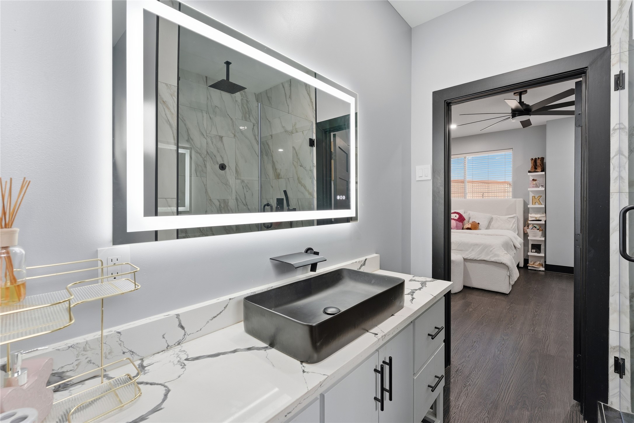 7737 Edna Street Houston, TX 77087 - Photo 36 of 43 a bathroom with a sink and a mirror