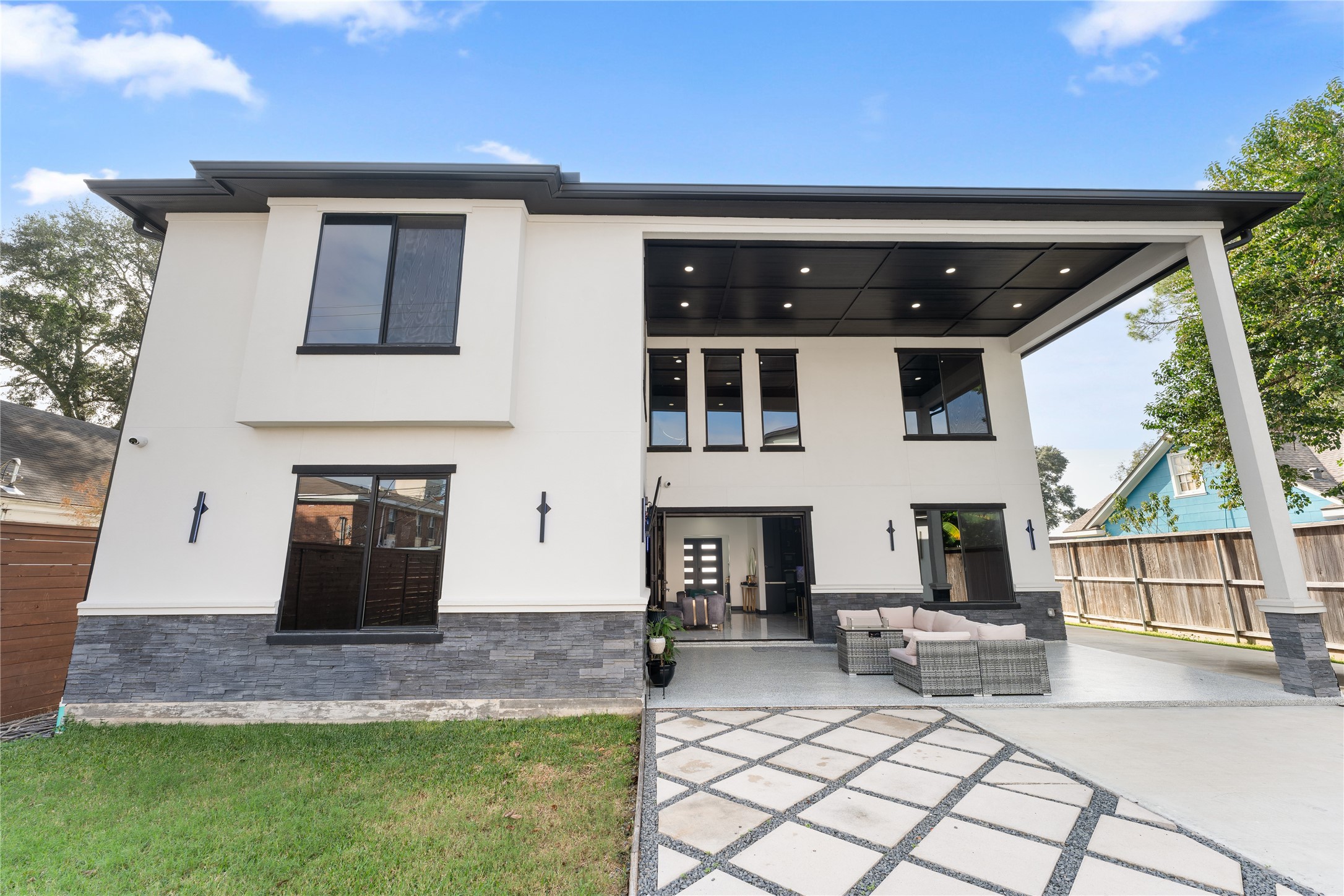 7737 Edna Street Houston, TX 77087 - Photo 43 of 43 a view of a patio with table and chairs and potted plants