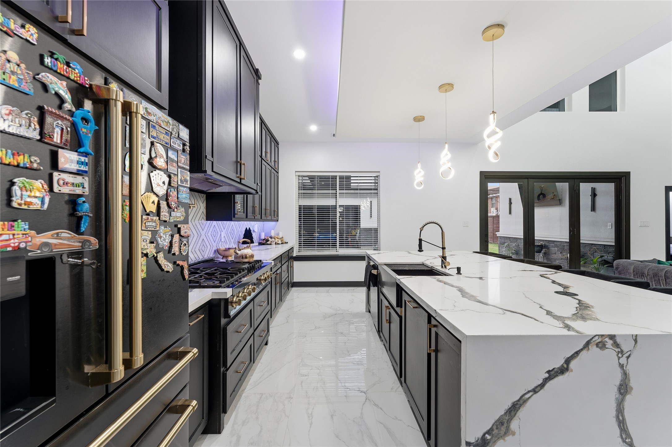 7737 Edna Street Houston, TX 77087 - Photo 8 of 43 a kitchen filled a counter space a sink appliances and cabinets