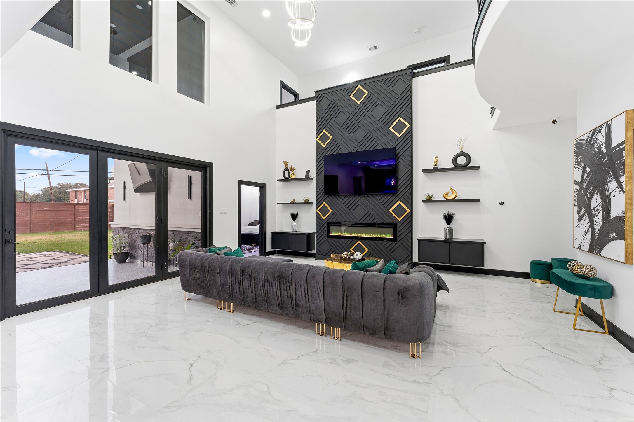 7737 Edna Street Houston, TX 77087 - Photo 9 of 43 a living room with furniture a fireplace and a flat screen tv