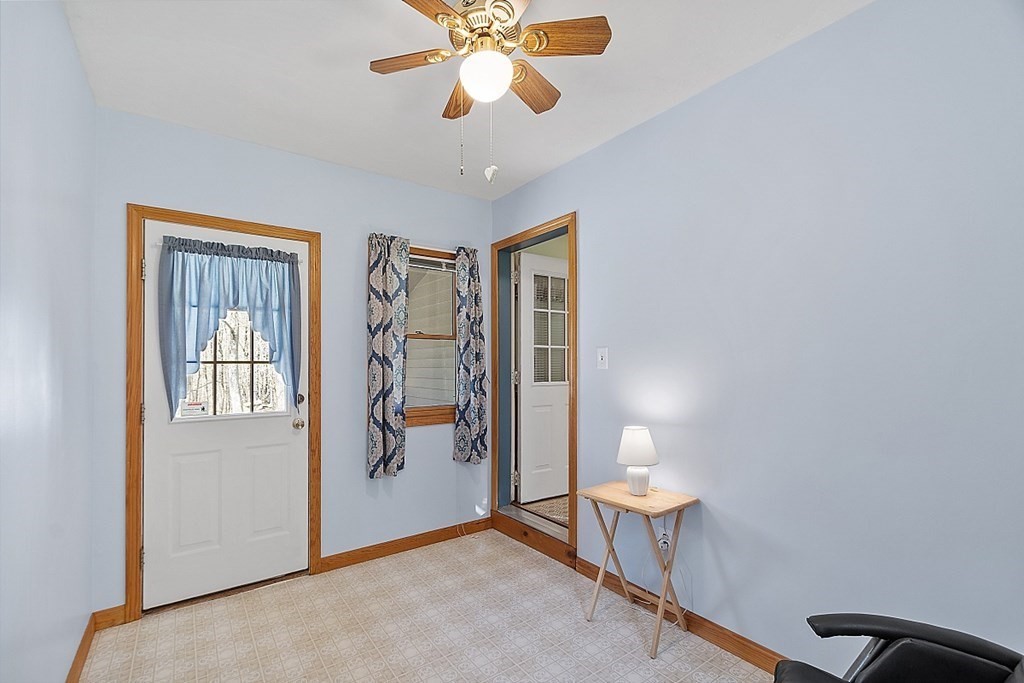 20 Rhodes Road Princeton, MA 01541 - Photo 28 of 35 a view of a livingroom with a chandelier fan and a window