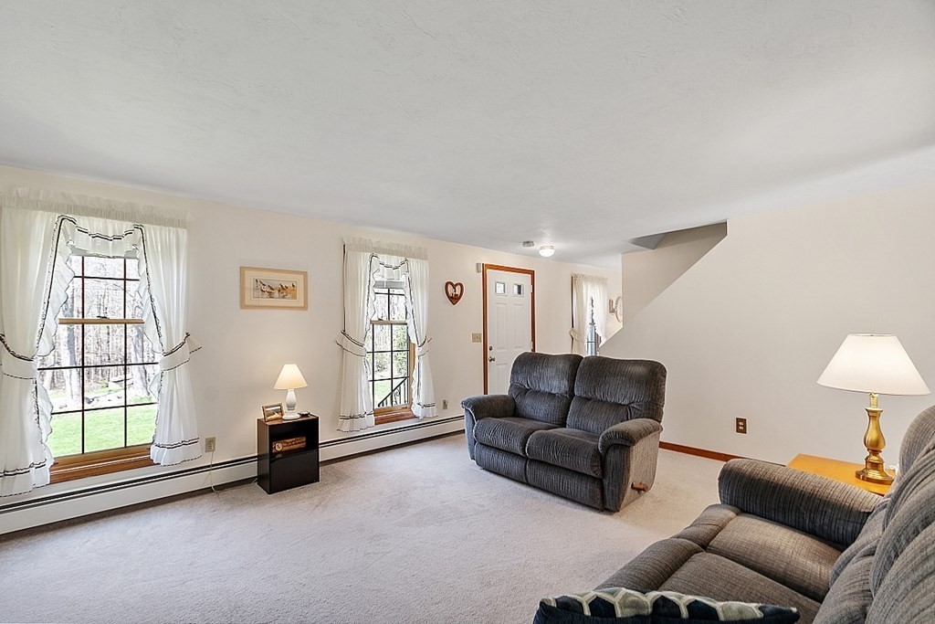 20 Rhodes Road Princeton, MA 01541 - Photo 3 of 35 a living room with furniture and a window