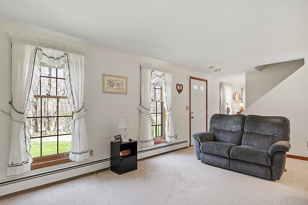 20 Rhodes Road Princeton, MA 01541 - Photo 4 of 35 a living room with furniture and a window