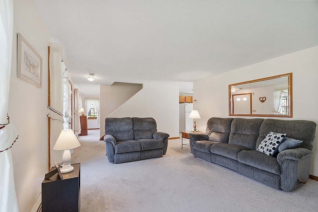 20 Rhodes Road Princeton, MA 01541 - Photo 6 of 35 a living room with furniture and a couch