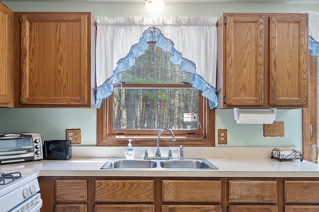 20 Rhodes Road Princeton, MA 01541 - Photo 8 of 35 a kitchen with sink cabinets and window