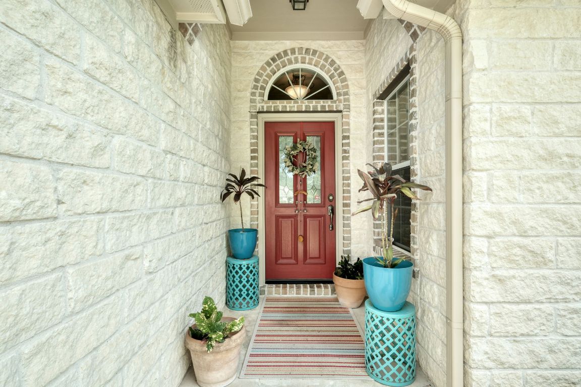 102 Texas Traditions Georgetown, TX 78628 - Photo 4 of 32 a view of a entryway door of the house