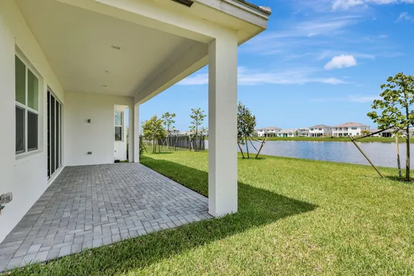 a view of a patio with a garden