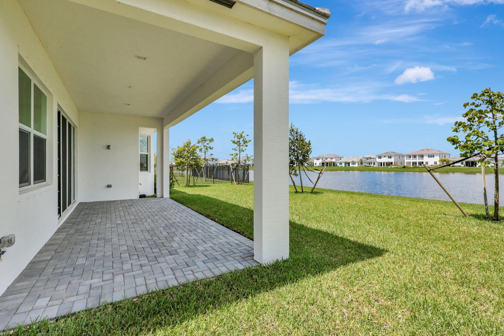 5403 Macoon Way Westlake, FL 33470 - Photo 33 of 51 a view of a patio with a garden