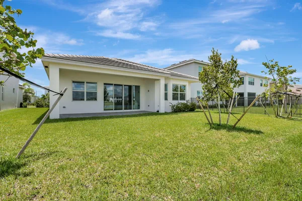 a view of a house with a swimming pool