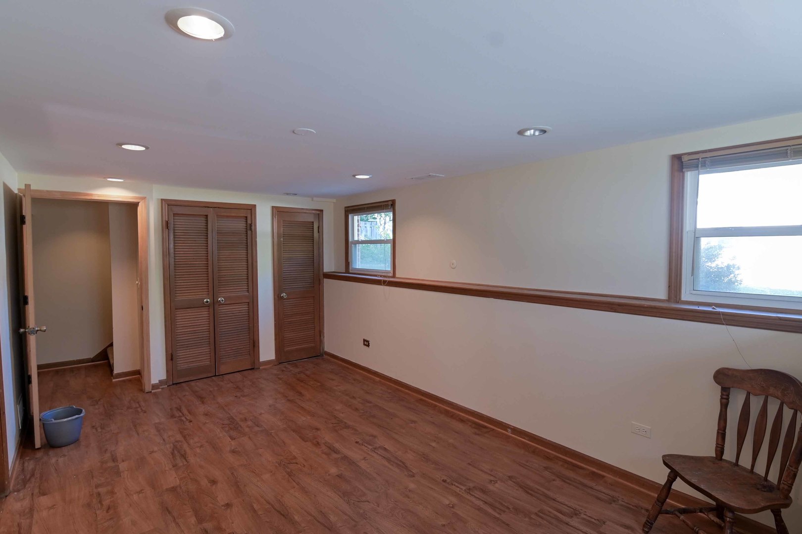 2729 Lowery Court Zion, IL 60099 - Photo 20 of 36 a view of an empty room with wooden floor and a window