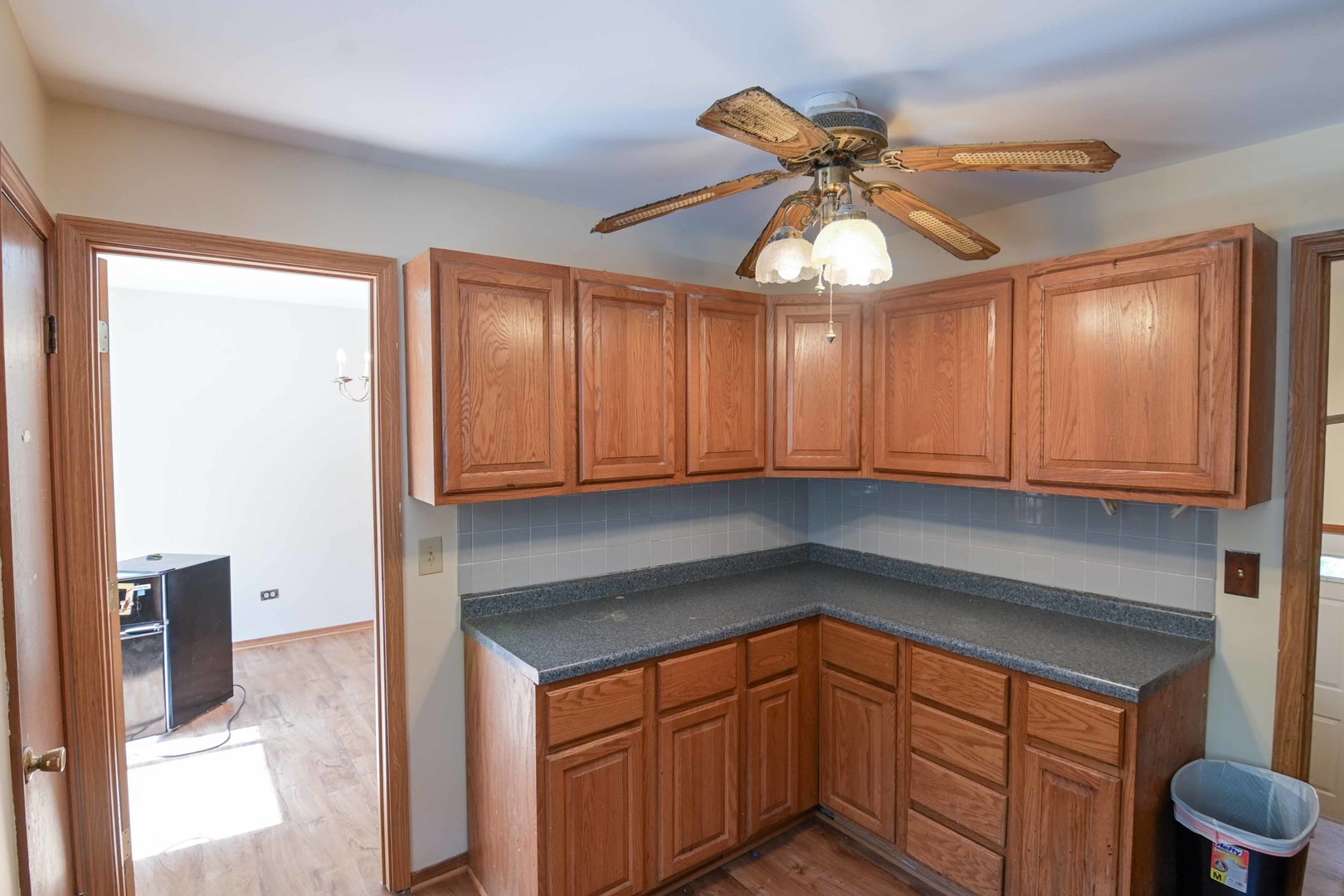 2729 Lowery Court Zion, IL 60099 - Photo 4 of 36 a kitchen with stainless steel appliances granite countertop a sink cabinets and a window