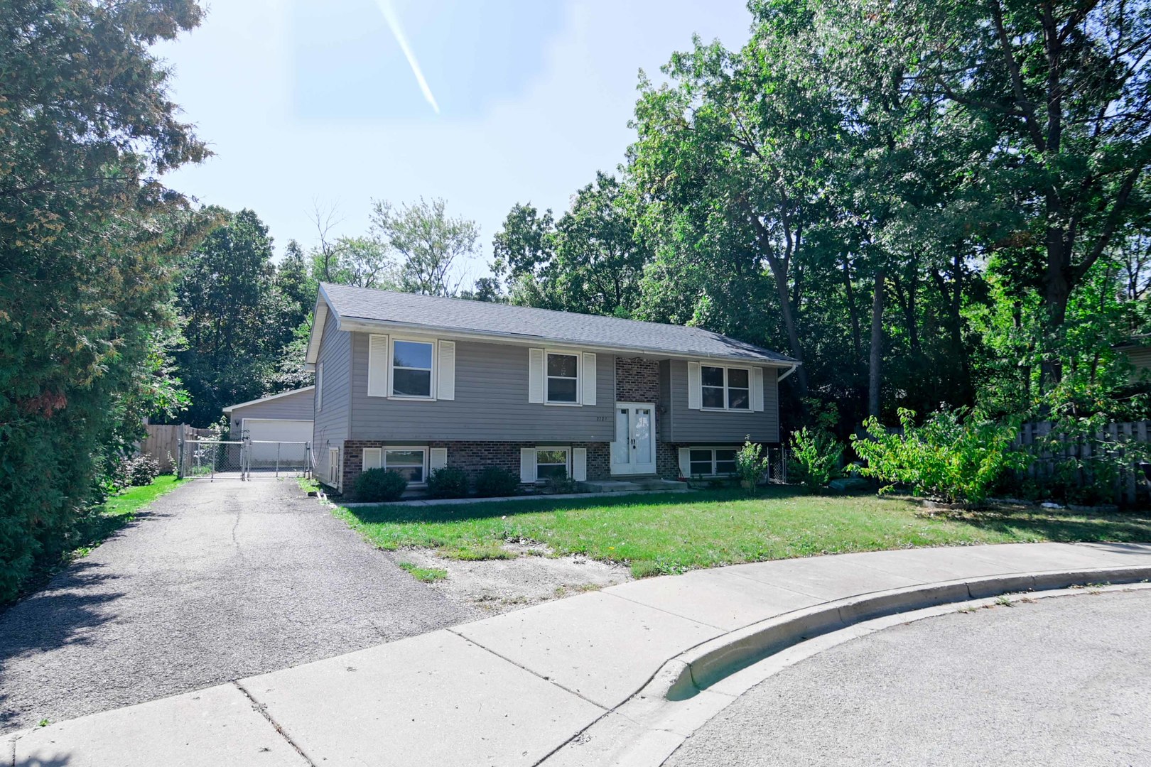 2729 Lowery Court Zion, IL 60099 - Photo 36 of 36 a front view of a house with garden