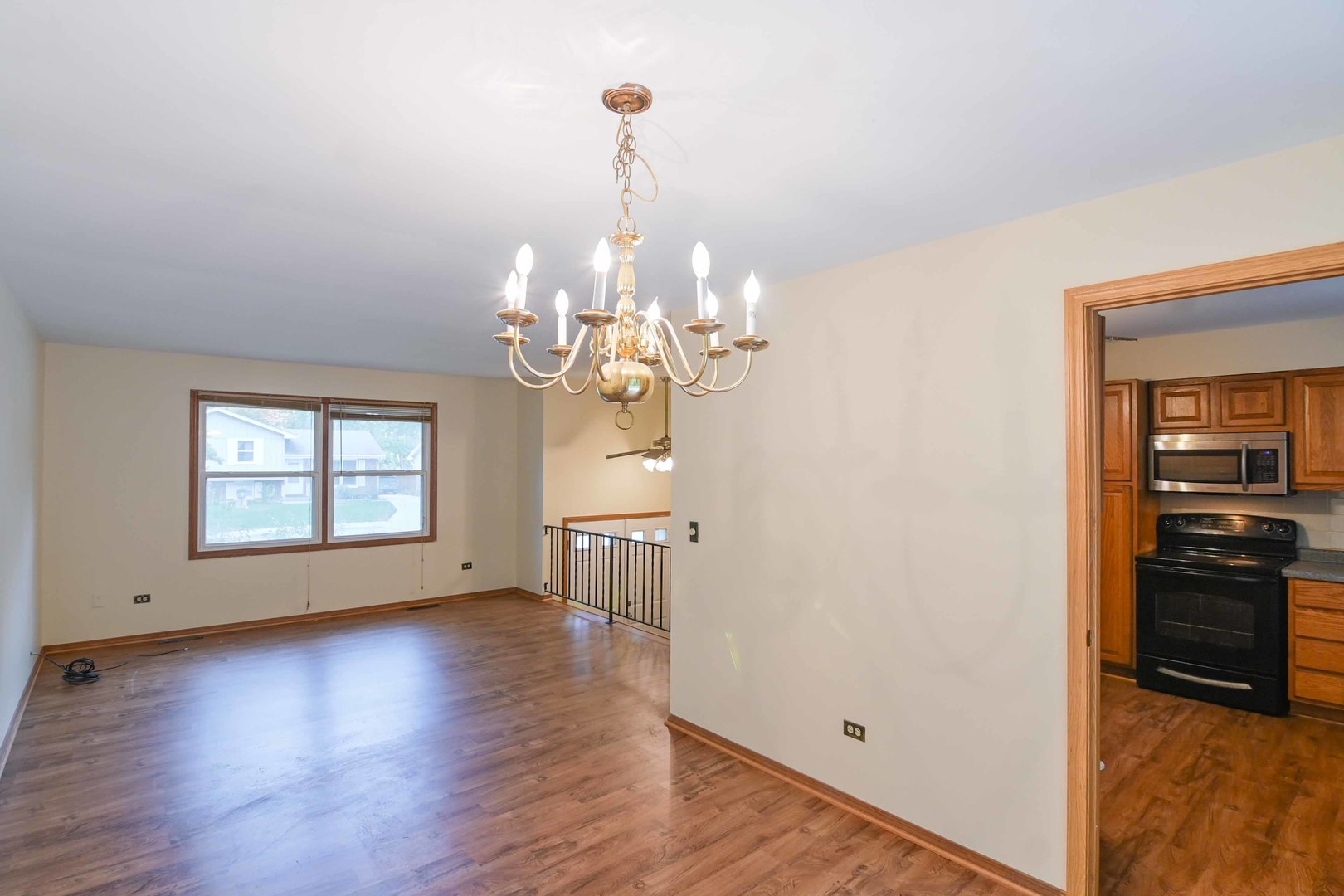 2729 Lowery Court Zion, IL 60099 - Photo 6 of 36 a view of a livingroom with a chandelier