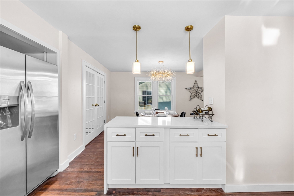 20 Walnut Street Gill, MA 01354 - Photo 14 of 42 a view of a kitchen with kitchen island a counter top space appliances and cabinets