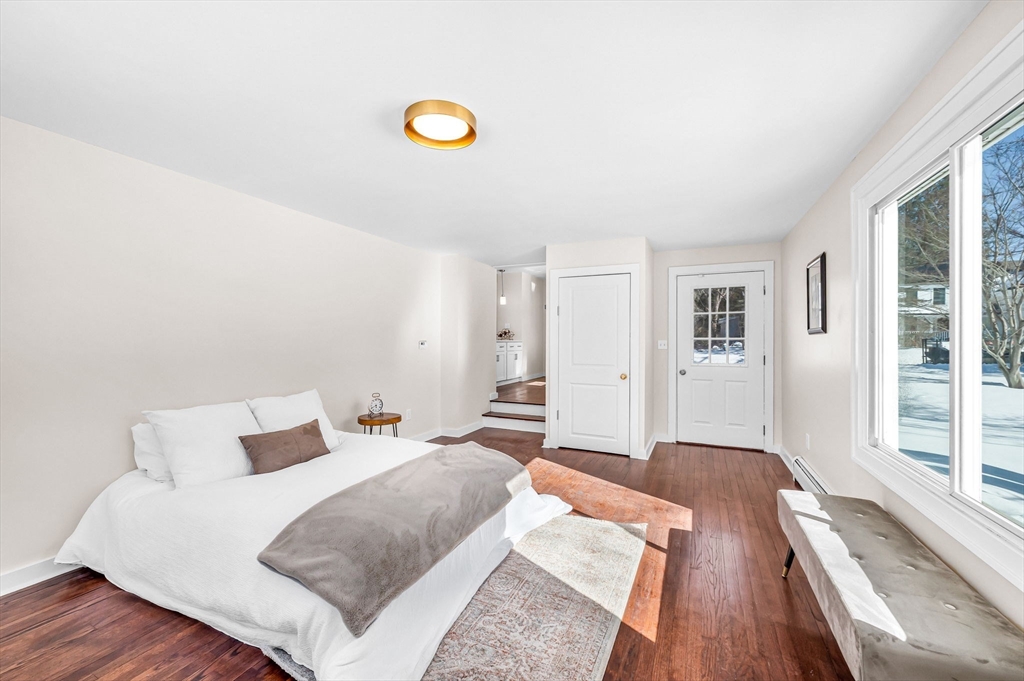 20 Walnut Street Gill, MA 01354 - Photo 19 of 42 a bedroom with a bed and a large window