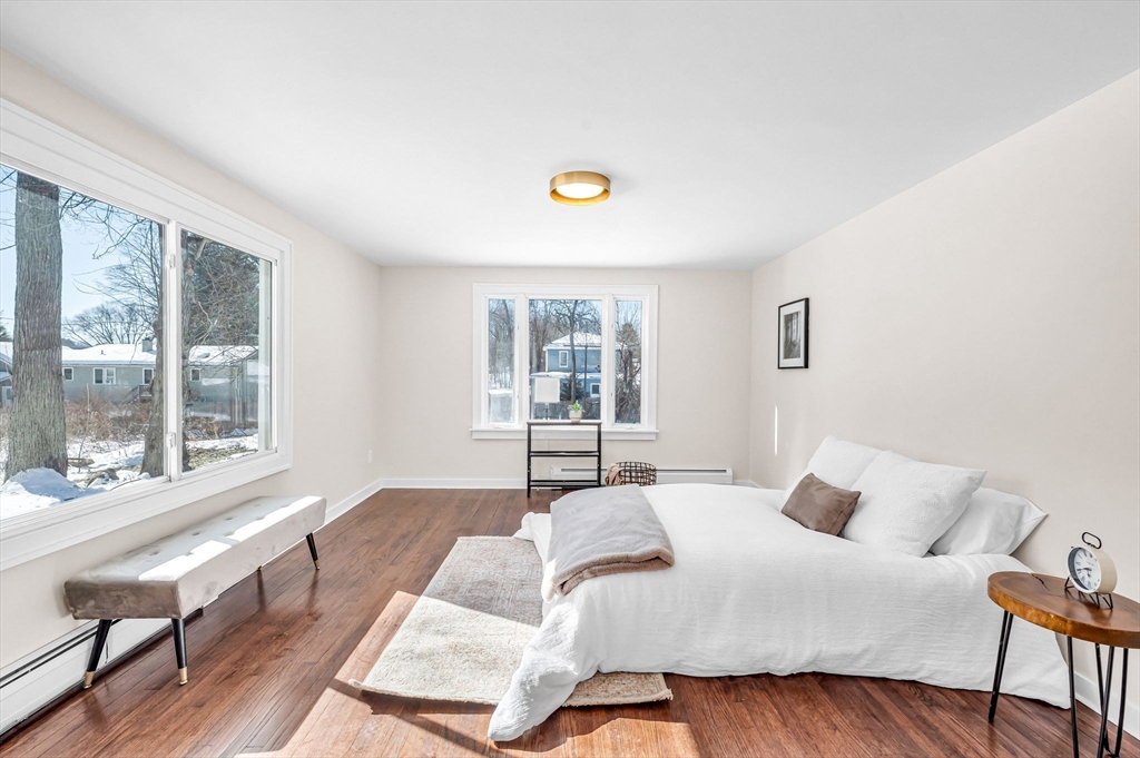 20 Walnut Street Gill, MA 01354 - Photo 20 of 42 a bedroom with a bed and a large window