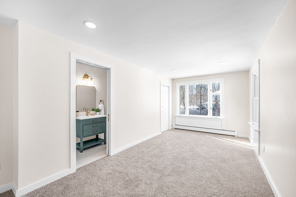 20 Walnut Street Gill, MA 01354 - Photo 21 of 42 an empty room with windows and closet