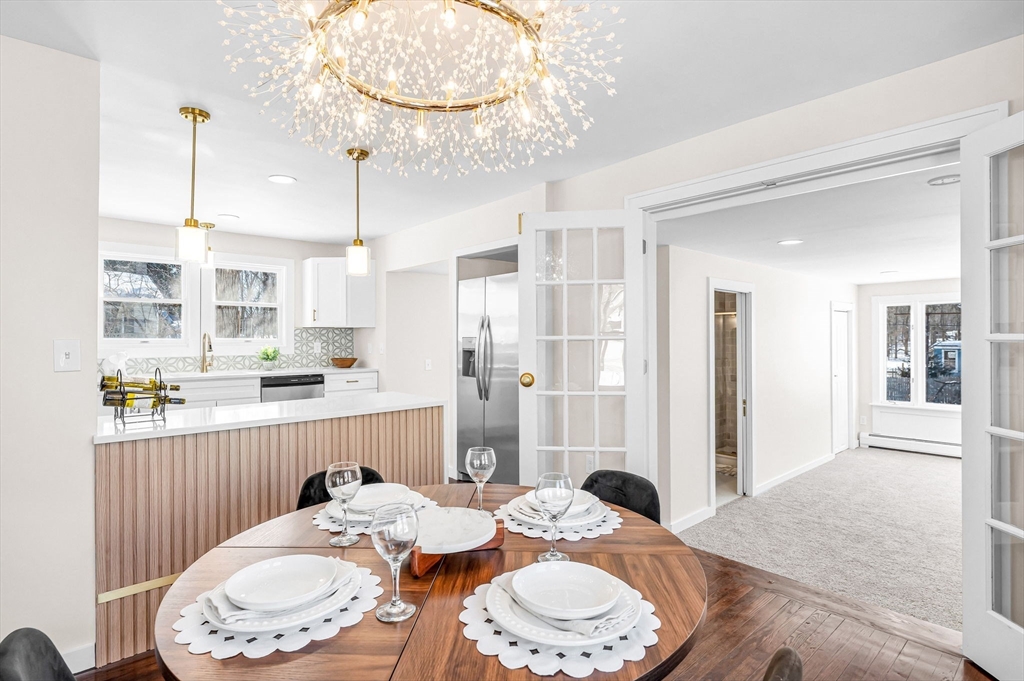 20 Walnut Street Gill, MA 01354 - Photo 10 of 42 a dining room with furniture and a chandelier