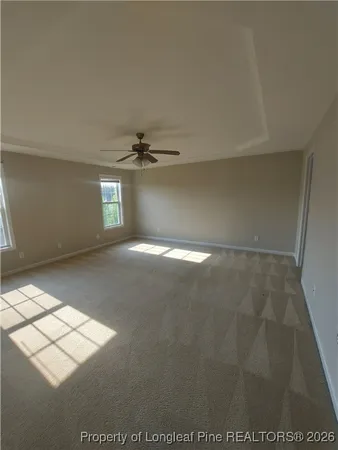 a room with a sink and chandelier