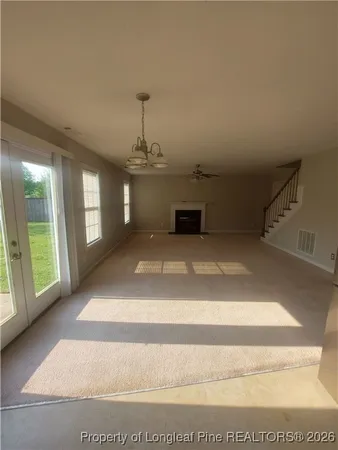 a view of a livingroom with a fireplace