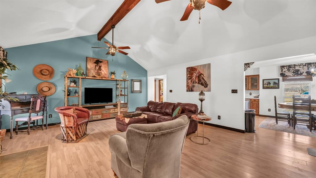 351 Don Propp Road Azle, TX 76020 - Photo 7 of 36 a living room with furniture and a flat screen tv