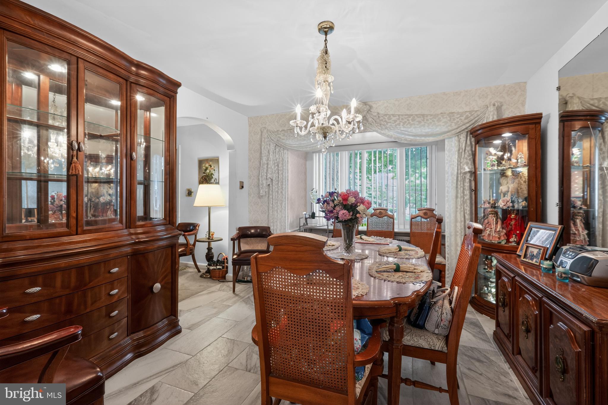 1424 Burmont Road Havertown, PA 19083 - Photo 7 of 37 a view of a dining room with furniture and window