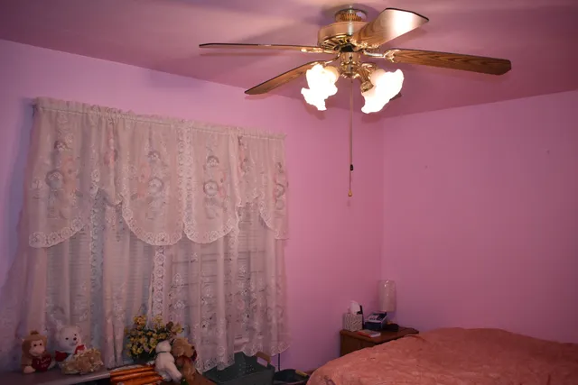a bathroom with a sink mirror and vanity