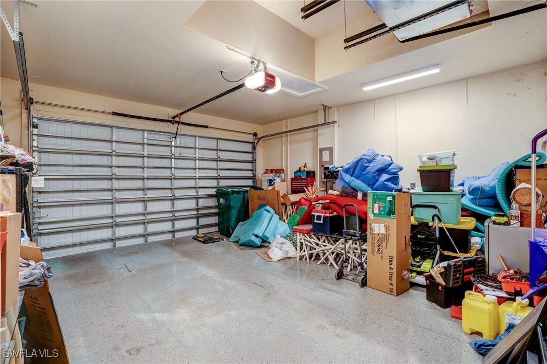 9292 Cayman Drive Naples, FL 34114 - Photo 26 of 50 a view of a room with gym equipment