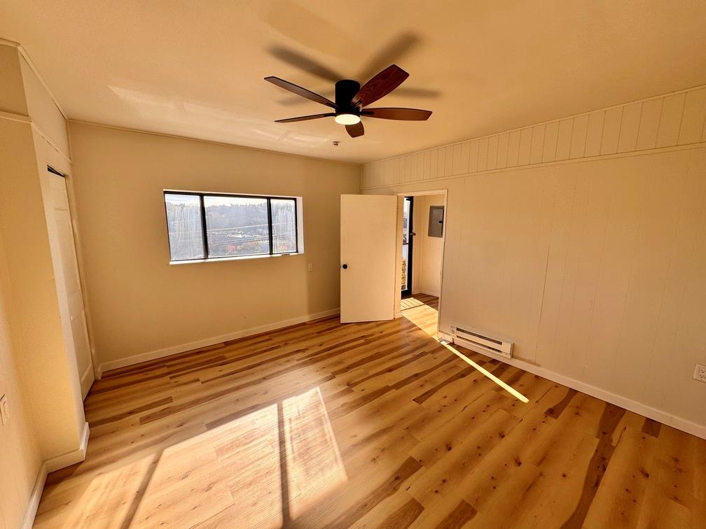 1332 Goettmann Street, Unit 3 Pittsburgh, PA 15212 - Photo 16 of 24 a view of a livingroom with a ceiling fan