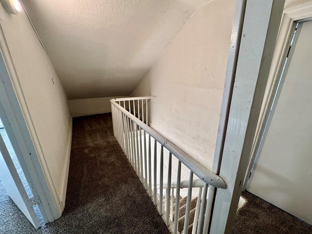 1332 Goettmann Street, Unit 3 Pittsburgh, PA 15212 - Photo 20 of 24 a view of a hallway with a stairs