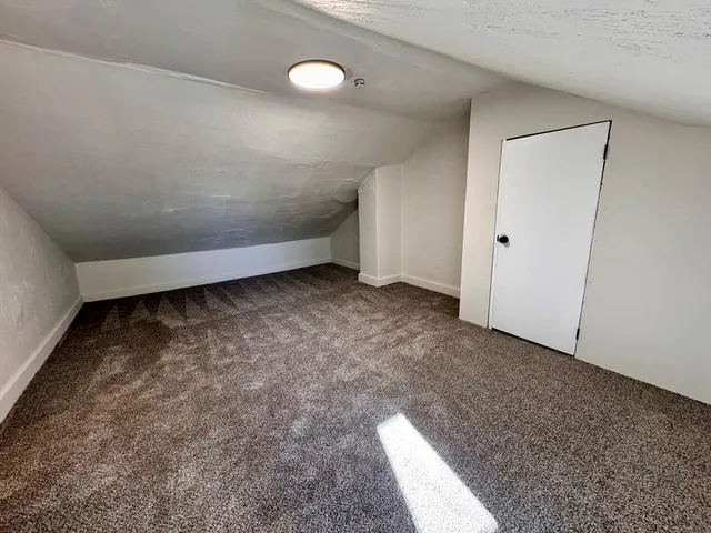 a view of a room with an empty space