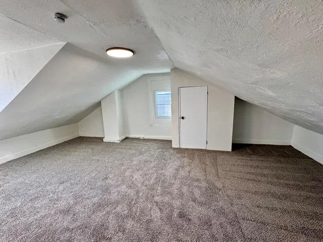 an empty room with a natural light