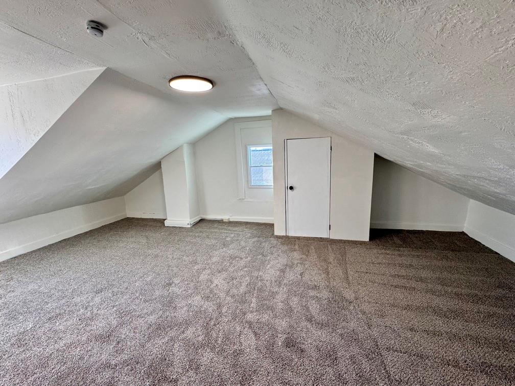 1332 Goettmann Street, Unit 3 Pittsburgh, PA 15212 - Photo 23 of 24 an empty room with a natural light