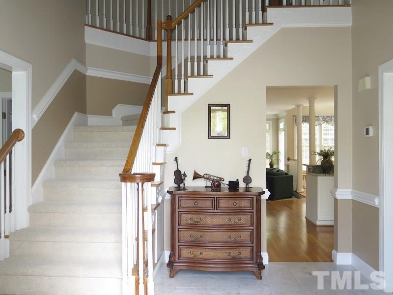 809 Nolstead Court Raleigh, NC 27614 - Photo 2 of 23 a view of entryway and hall with wooden floor