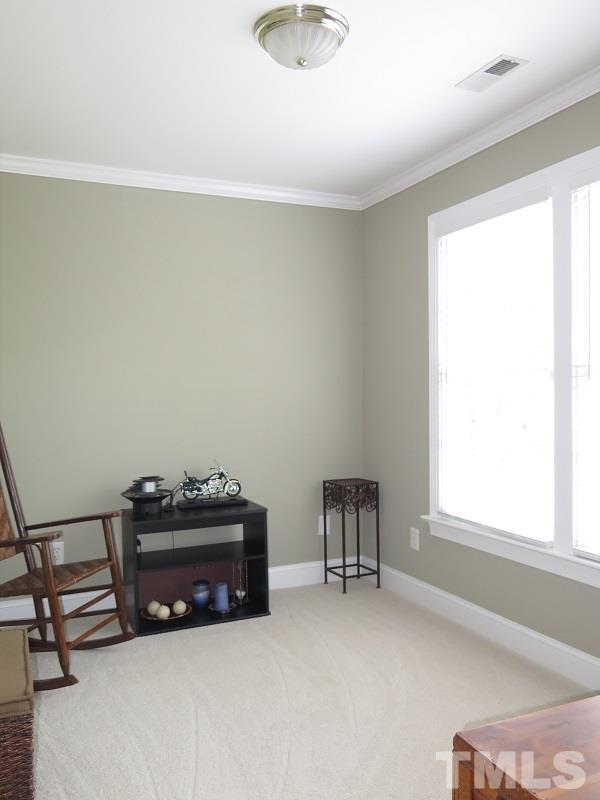 809 Nolstead Court Raleigh, NC 27614 - Photo 11 of 23 a living room with furniture and a window