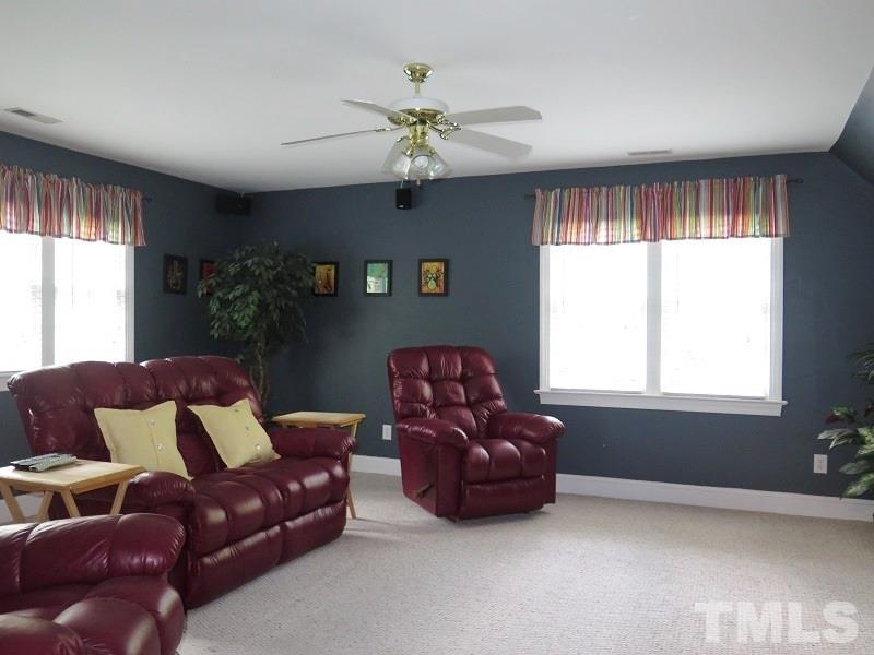 809 Nolstead Court Raleigh, NC 27614 - Photo 18 of 23 a living room with furniture and a window