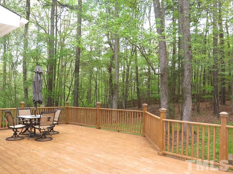 809 Nolstead Court Raleigh, NC 27614 - Photo 21 of 23 a view of a lake with outdoor seating